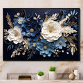 Framed 3D textured abstract botanical floral wall art with navy blue, white, and gold paper flowers.
