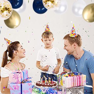 Family celebrating with cake and presents, surrounded by navy blue, pearl white, and gold confetti balloons.