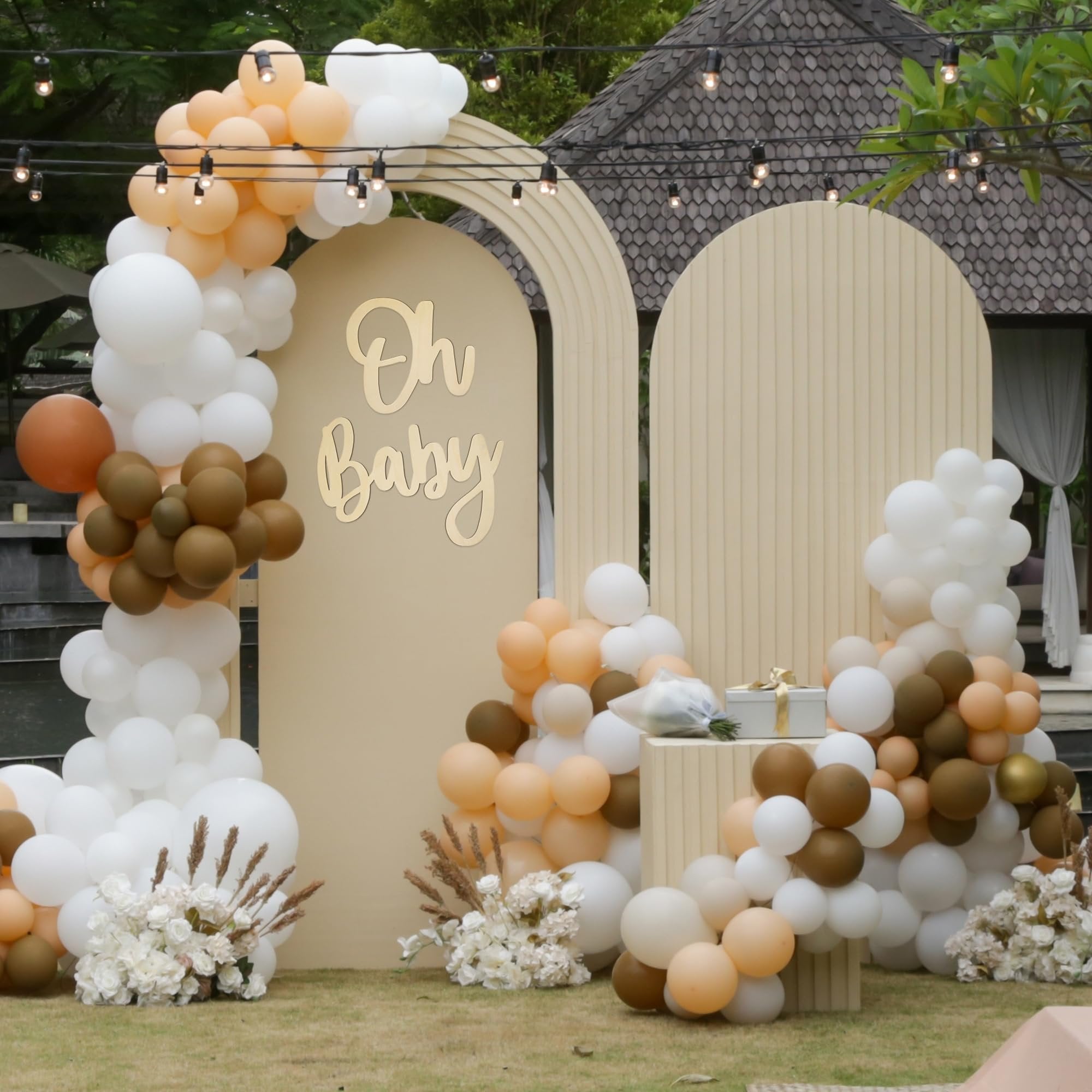 Oh Baby wooden sign decoration for baby showers with balloons and floral arrangements