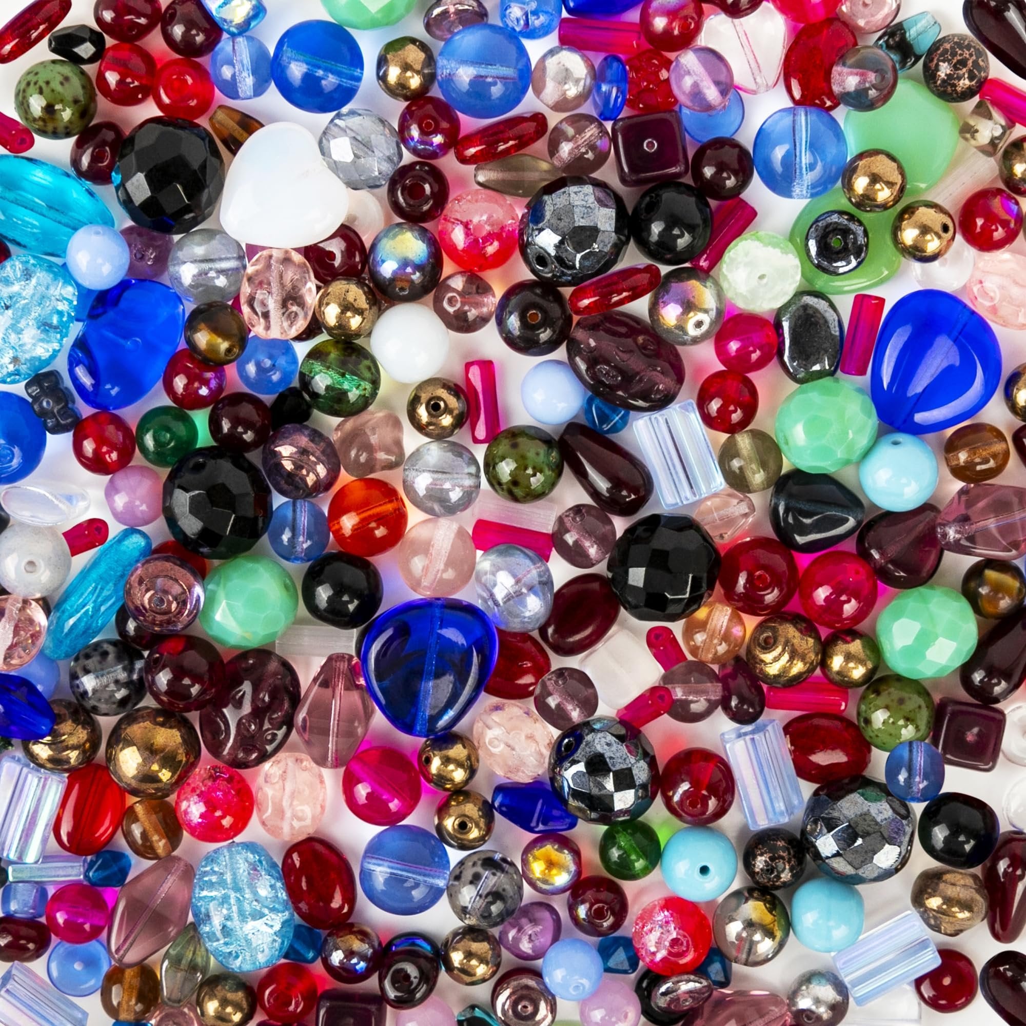 Assorted glass beads in various shapes, sizes, and colors including red, blue, green, black, and gold.