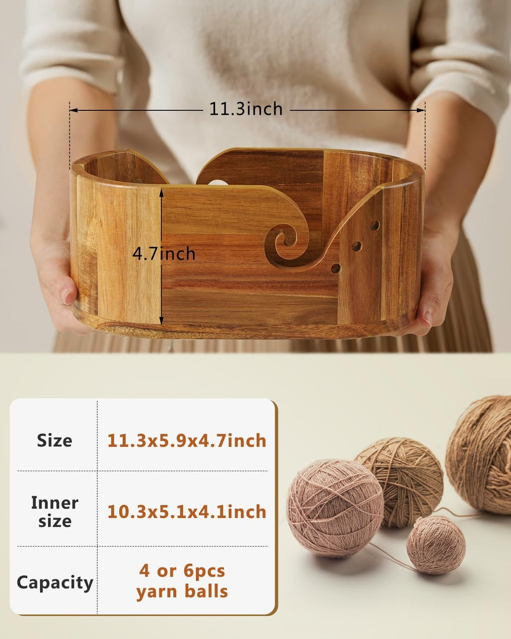 Oval acacia wood yarn bowl held by a person, showing dimensions and capacity with yarn balls.