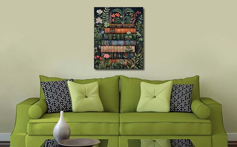 Paint by number canvas art depicting a stack of books surrounded by lush green foliage and colorful flowers, displayed above a green sofa.