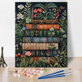 Paint by number kit with paints, brushes, and hardware, featuring a canvas with stacked books and floral designs.