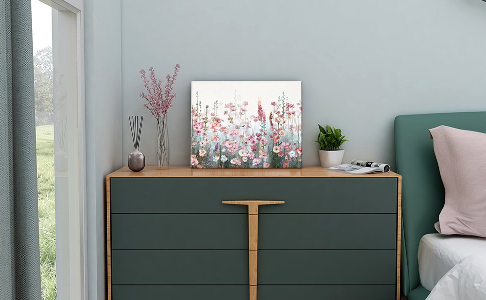 Pink wildflower floral painting displayed on a dresser next to a vase of flowers and a potted plant.