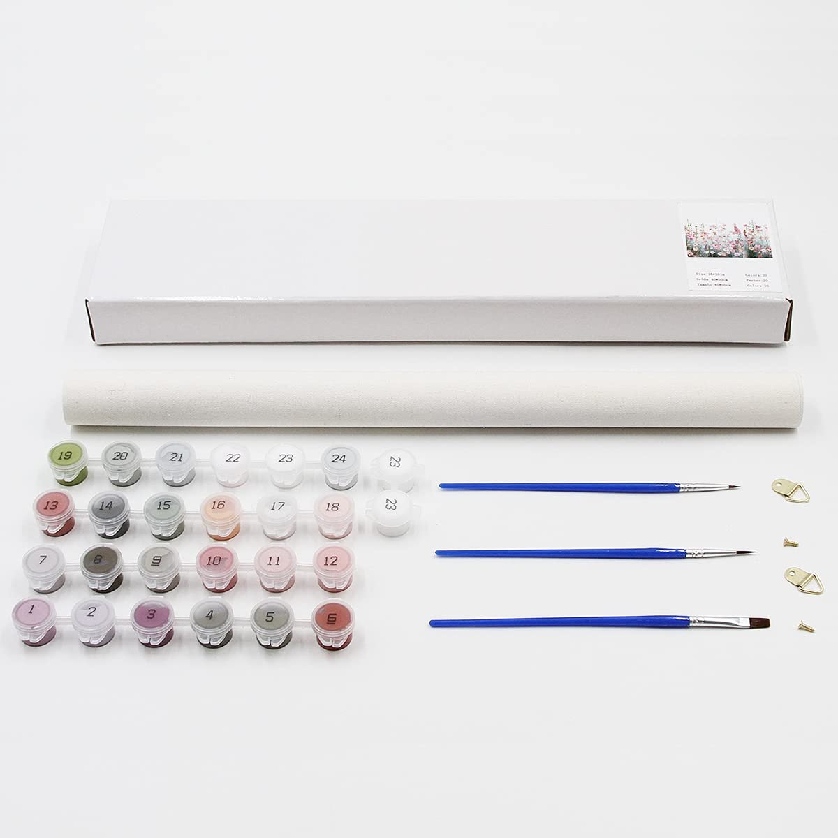 Paint by numbers kit contents including numbered paint pots, brushes, and hanging hardware on a white background.