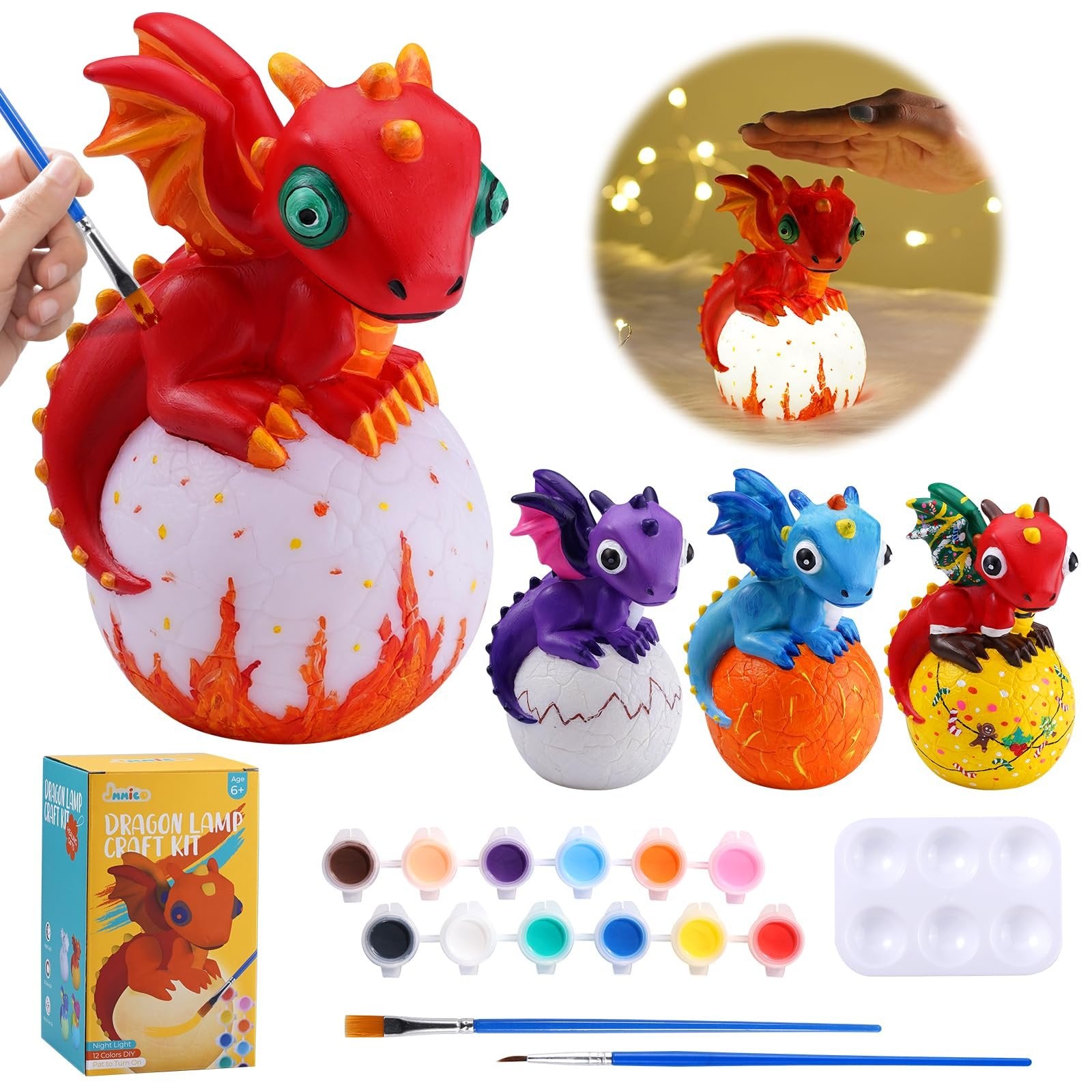 Paint-your-own dragon lamp craft kit with paints, brushes, palette, and multiple dragon figures.