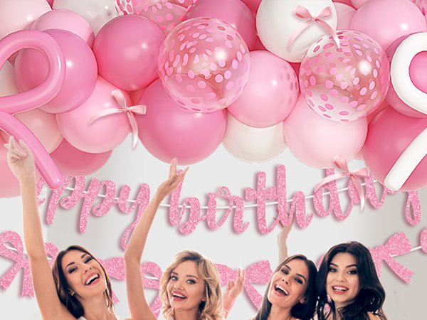 Pink and white balloons with confetti, a glitter banner, and women celebrating a birthday party
