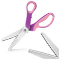 Purple and pink handled pinking shears with zigzag blades on a white background