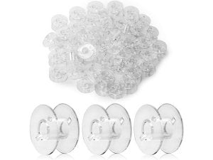 Clear plastic sewing machine bobbins, pile of 50 and three individual bobbins shown against a white background.