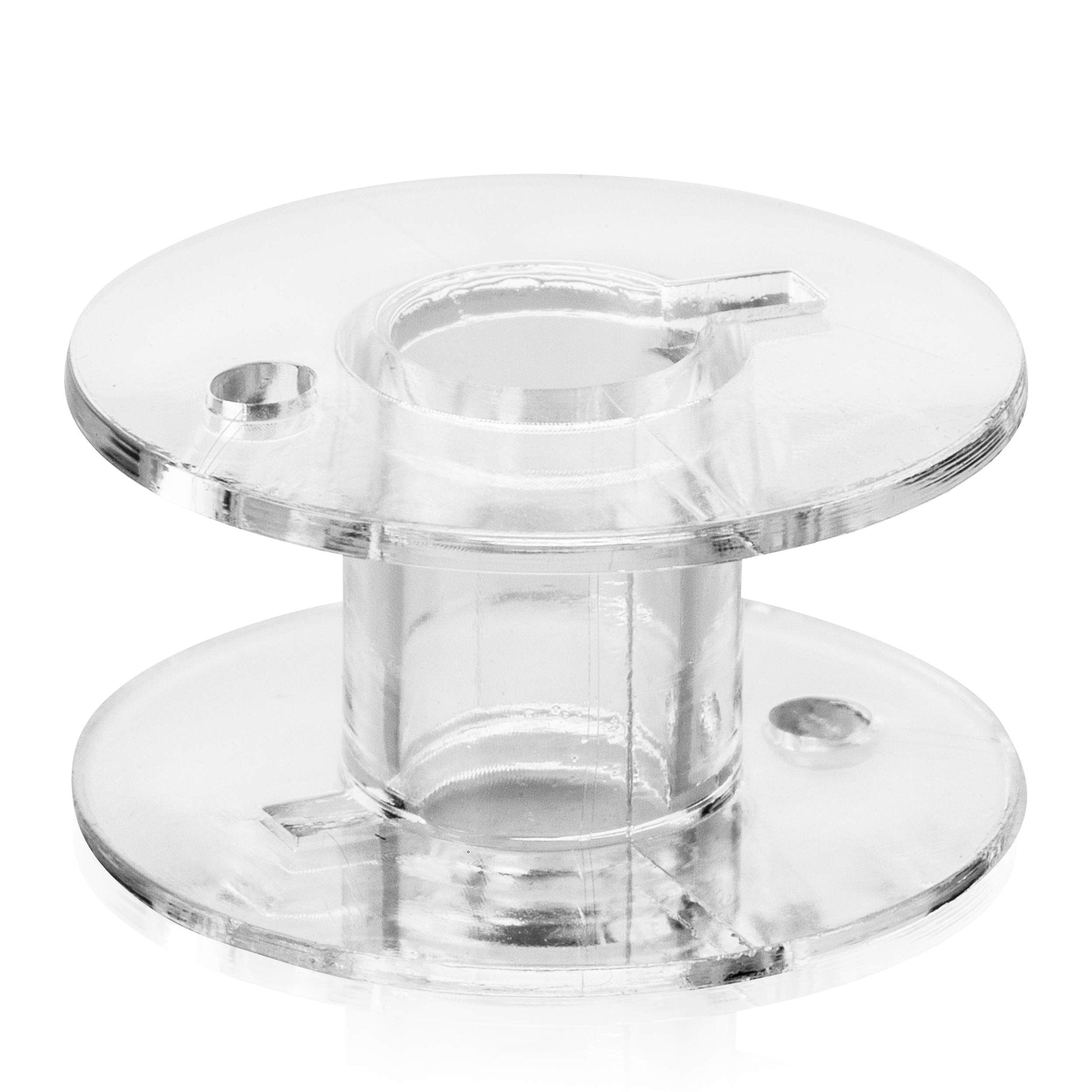 Clear plastic sewing machine bobbin shown from a 3/4 angle on a white background.