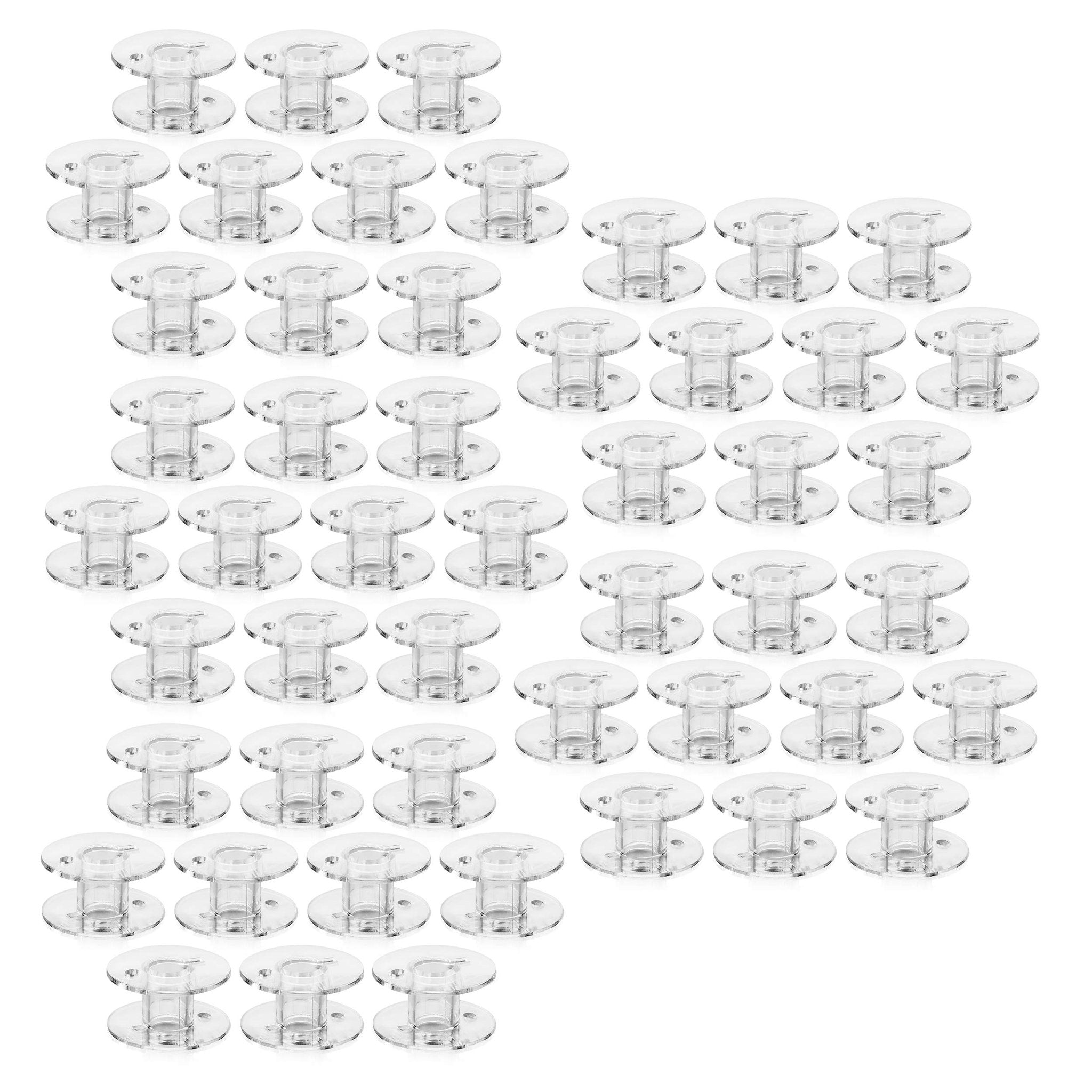 Clear plastic sewing machine bobbins arranged in rows on a white background.