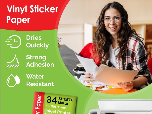 Woman smiling while holding papers with vinyl sticker paper packaging and printer in foreground