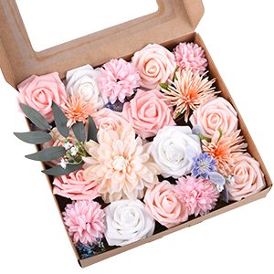 Box of assorted artificial silk flowers in pink, purple, and white for DIY arrangements.