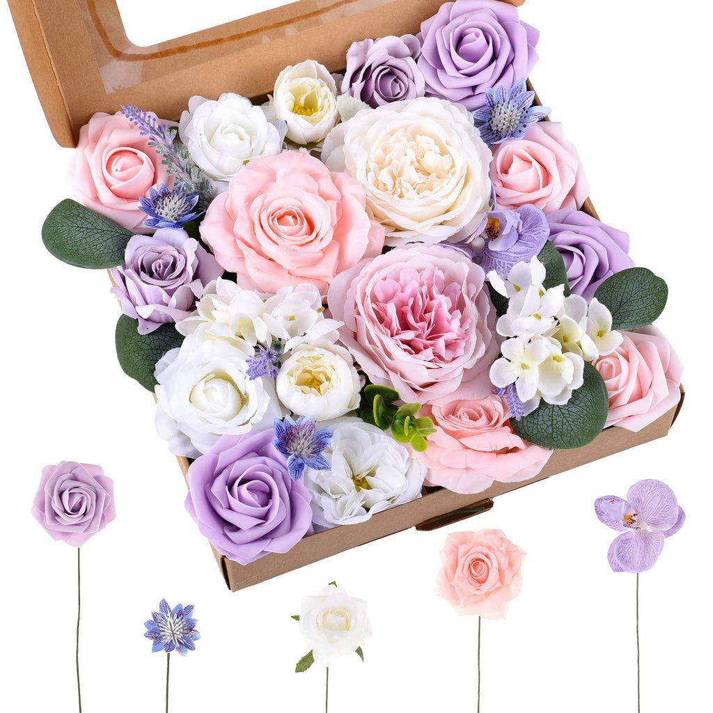 Box of assorted artificial silk flowers in pink, purple, and white, with some individual flowers displayed below.