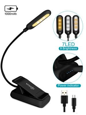 Black clip-on book light with flexible neck and 7 LEDs, showing power indicator and USB cables