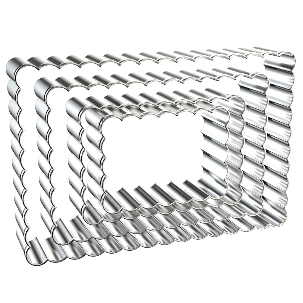 Set of four scalloped edge rectangle cookie cutters in graduated sizes, made of stainless steel.