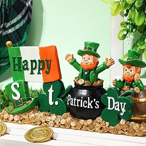 St. Patrick's Day decoration with two leprechauns, a pot of gold, and a flag that says Happy St. Patrick's Day.