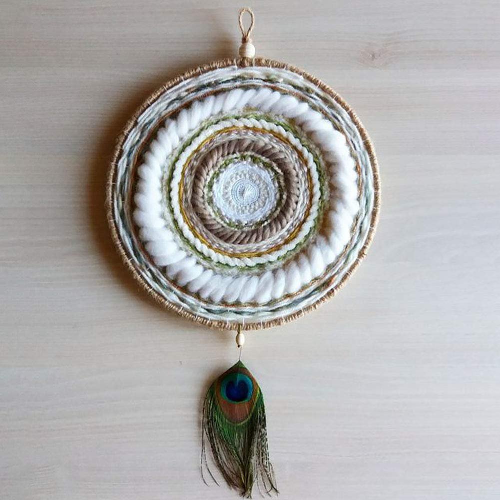 Circular woven wall hanging with neutral tones and a peacock feather accent, suspended by twine.