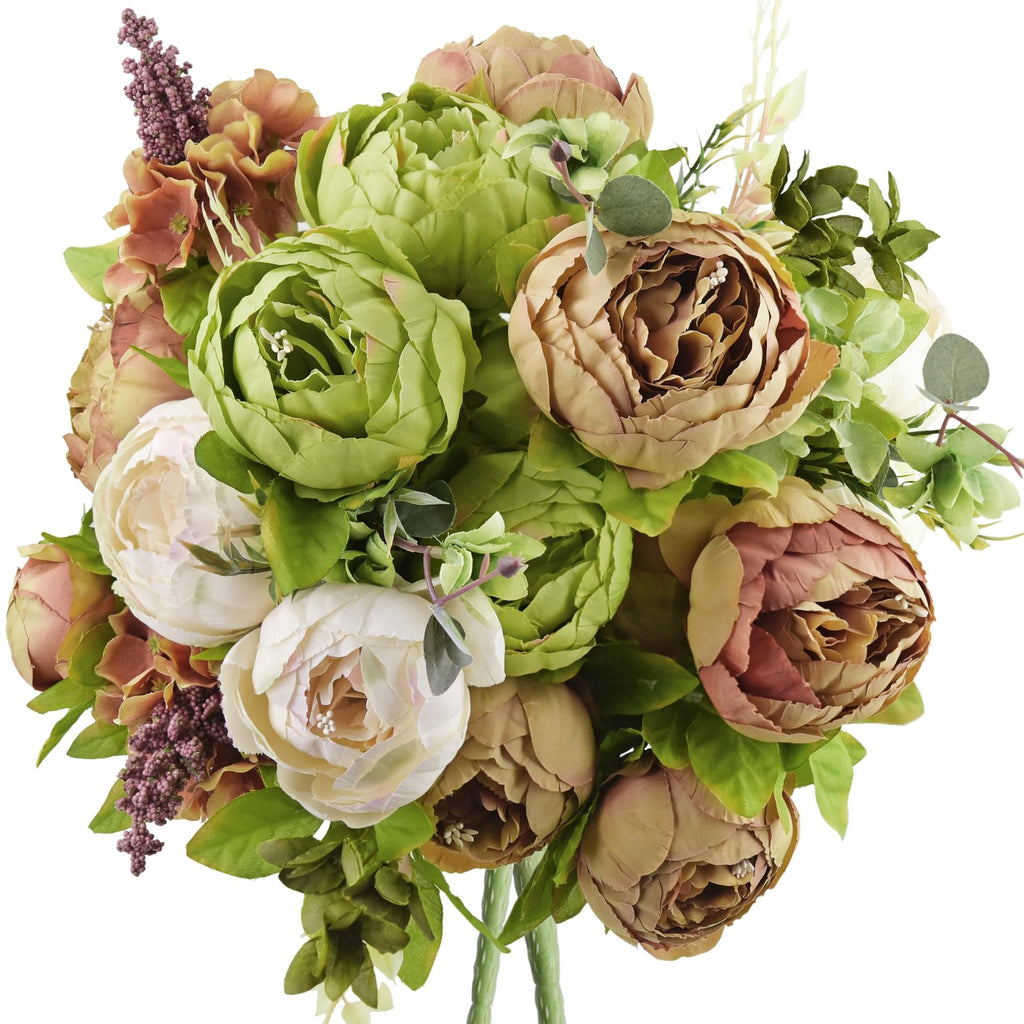 Close-up of a rustic bouquet of artificial peonies and hydrangeas in green, beige, and cream colors, with purple accents.