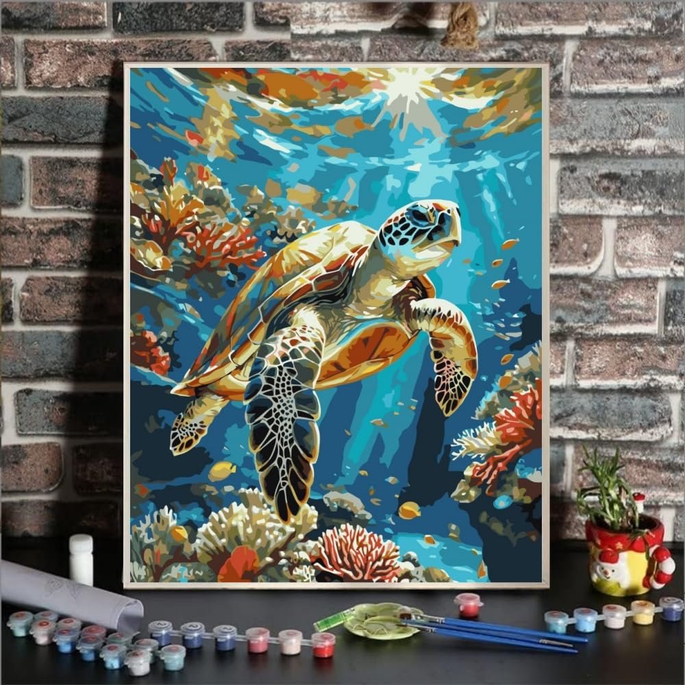 Sea turtle swimming underwater with coral reefs and sun rays, paint by numbers kit contents shown below