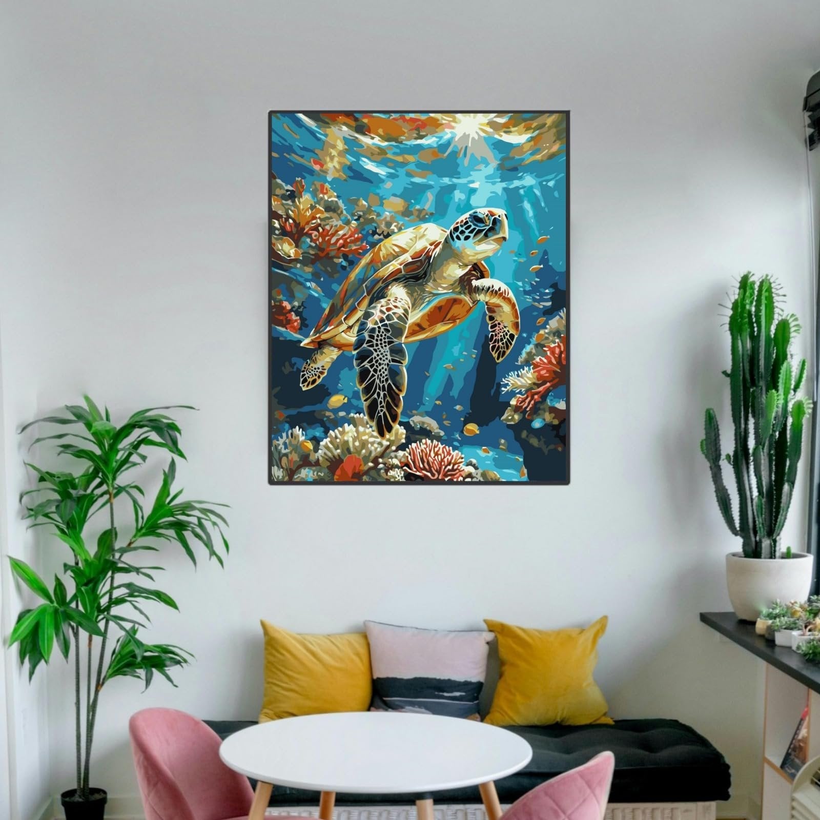 Sea turtle swimming in coral reef, framed paint by numbers artwork on wall above sofa