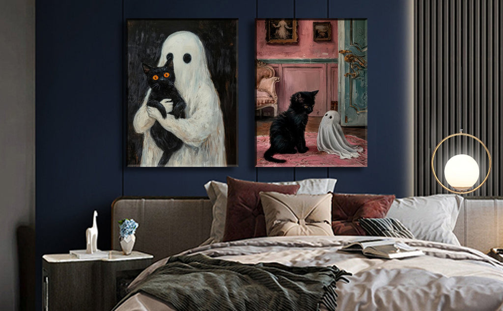 Two framed gothic Halloween canvas art prints of a ghost holding a black cat and a black cat with a ghost on a rug.