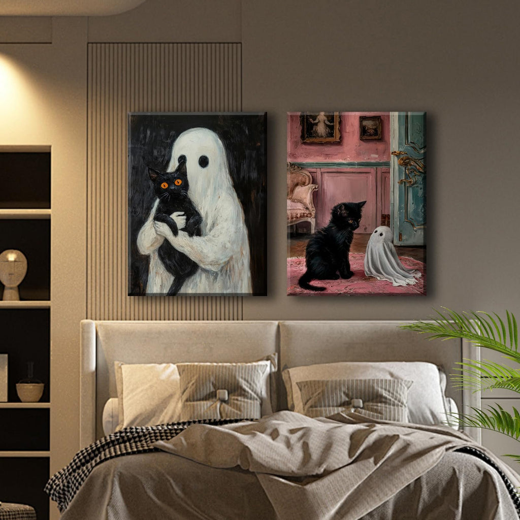 Two framed gothic Halloween canvas prints of a ghost holding a black cat and a black cat with a ghost on a pink rug, displayed above a bed.