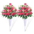 Two pink and red artificial rose bouquets with white vases and stakes, isolated on white.