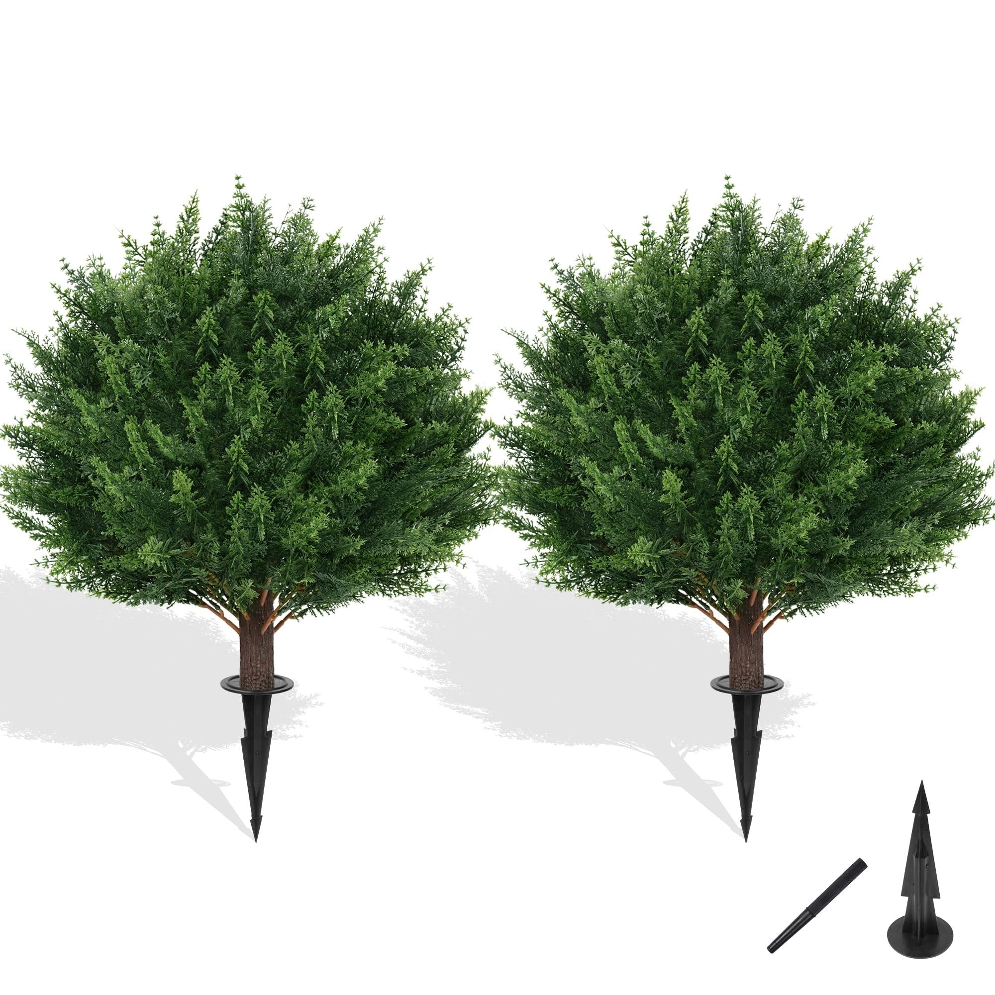 Two artificial cypress topiary trees with ground spikes on a white background, with separate ground spike accessories shown.