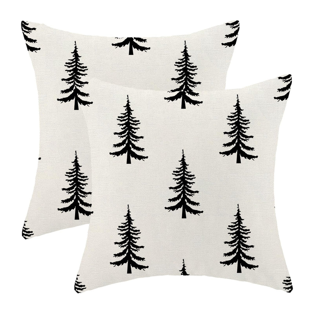 Two cream and black Christmas tree pattern pillow covers shown from the front.