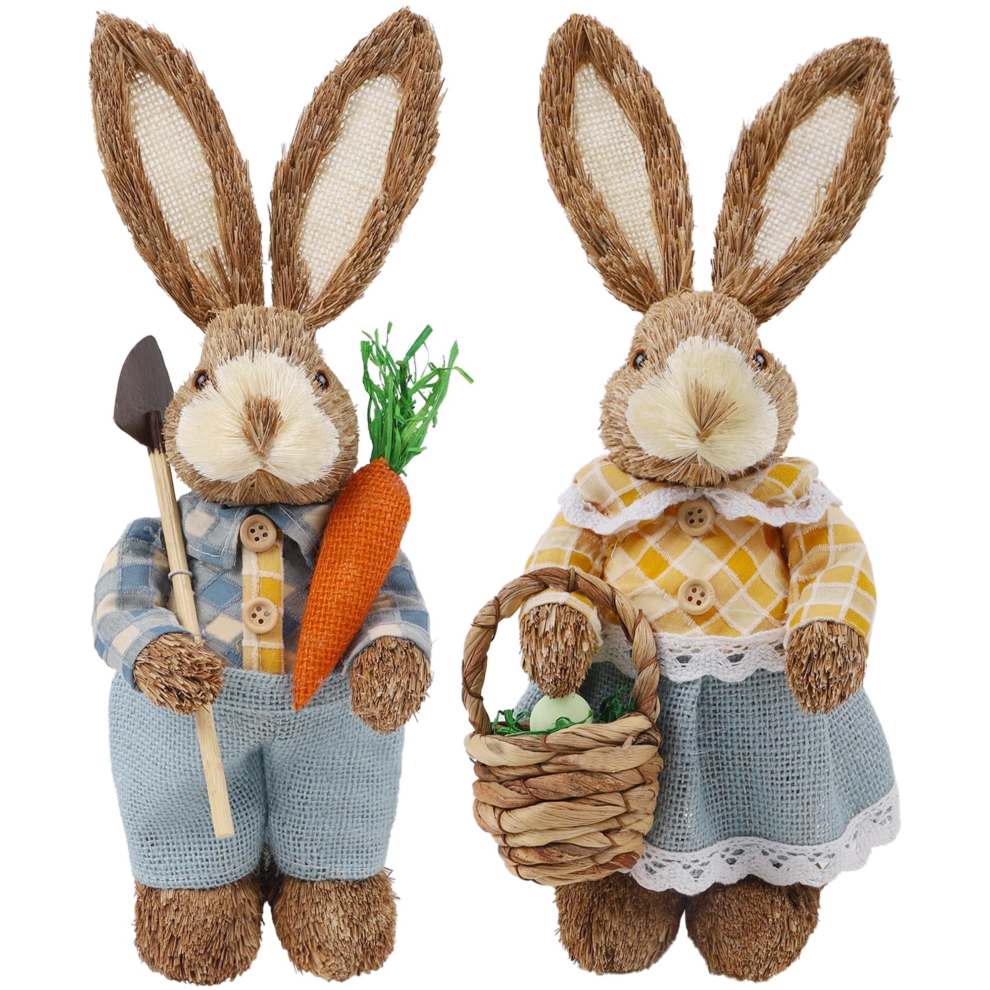 Two straw and sisal Easter bunny figurines, one holding a shovel and carrot, the other holding a basket with an egg.