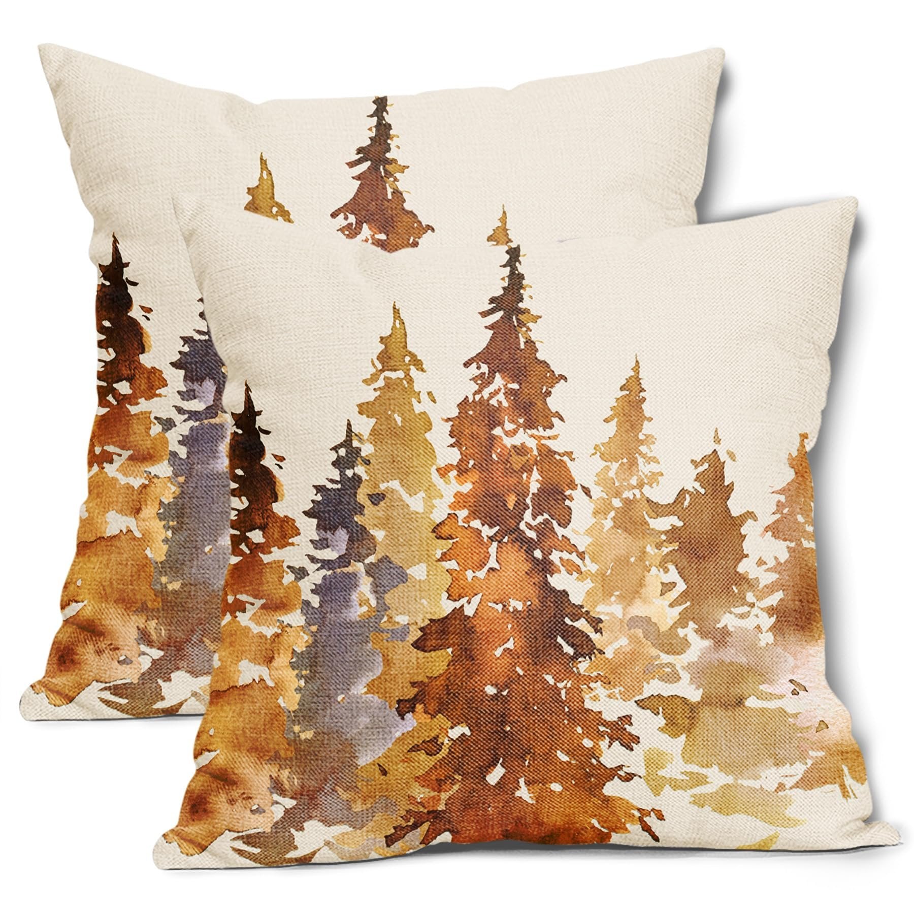 Two square pillow covers with a watercolor forest design in burnt orange and brown hues, shown at an angle.