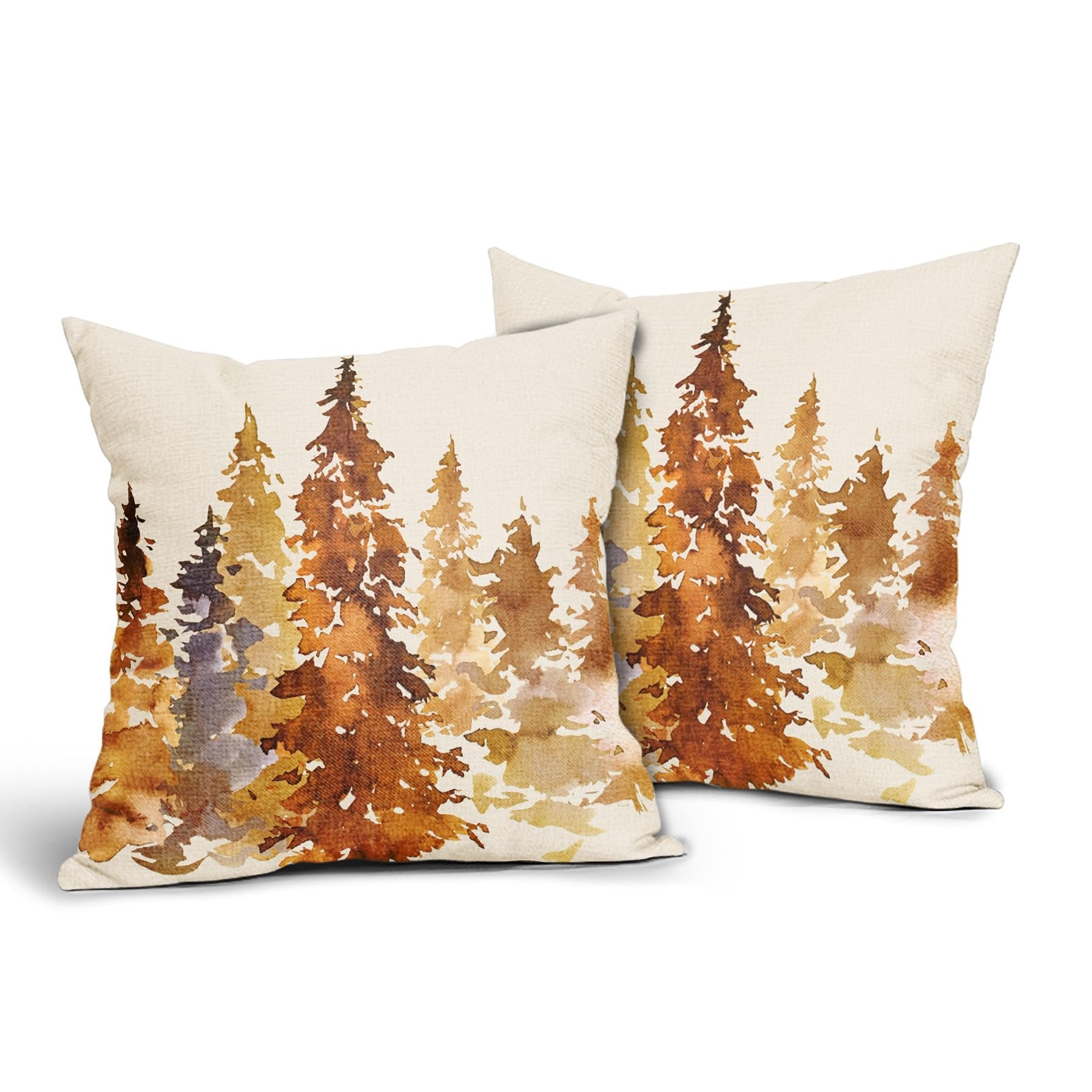 Two square pillow covers with a watercolor forest design in burnt orange and brown hues, shown at an angle on a white background.