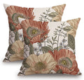 Two vintage floral pillow covers with brown rust botanical pattern, front view.