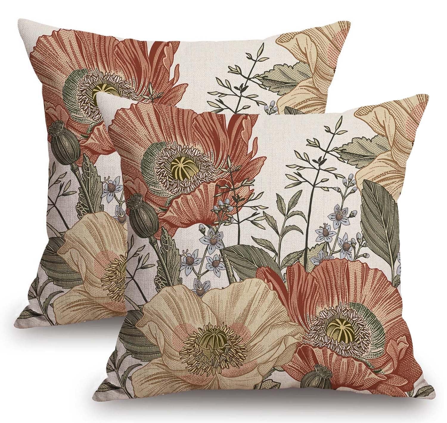 Two vintage floral pillow covers with brown rust botanical pattern, front view.