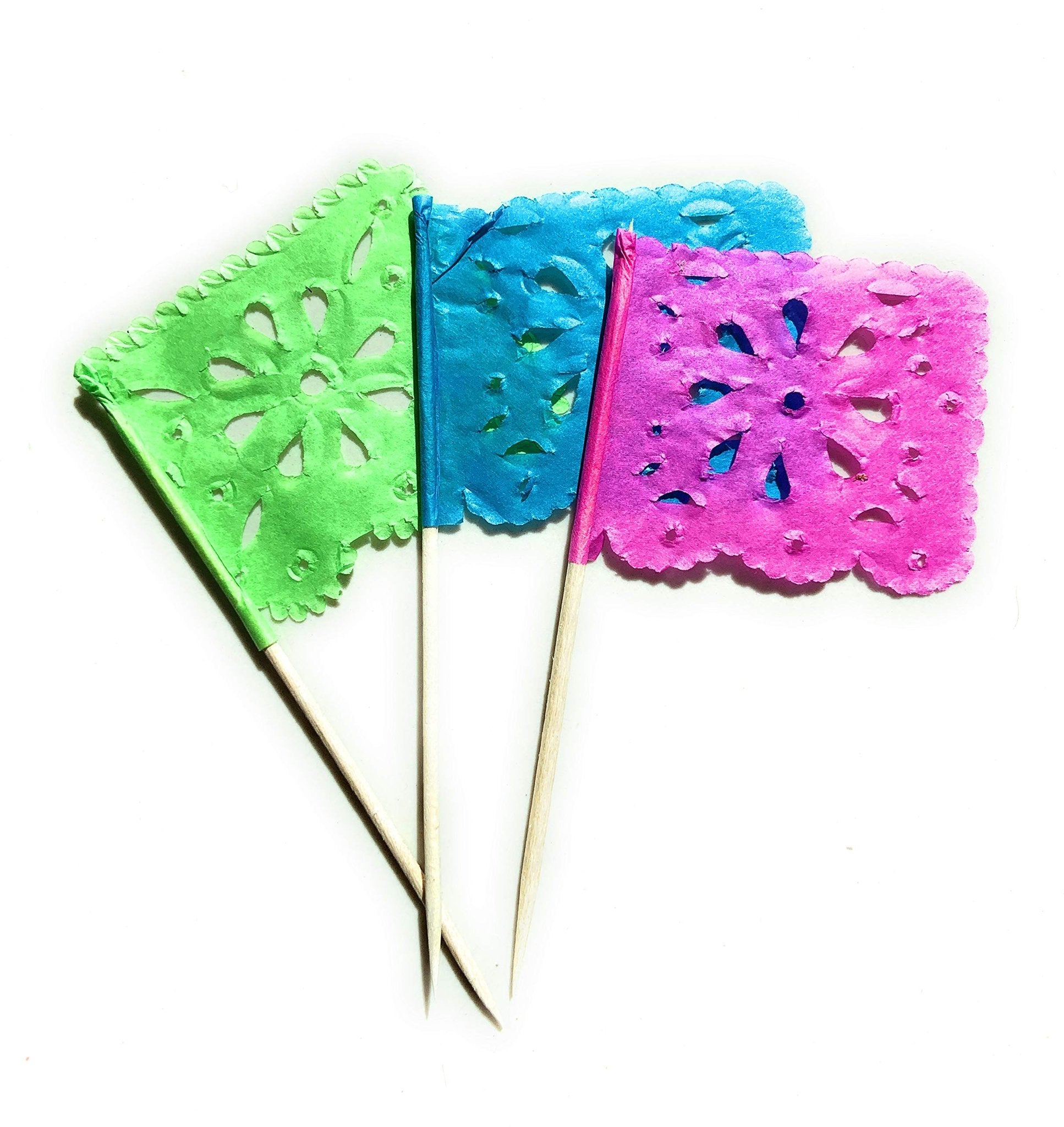 Three mini papel picado tissue paper flag picks in green, blue, and pink on wooden sticks.