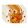 Set of 4 fall placemats featuring pumpkins and autumn leaves on a cream background with orange stripes.