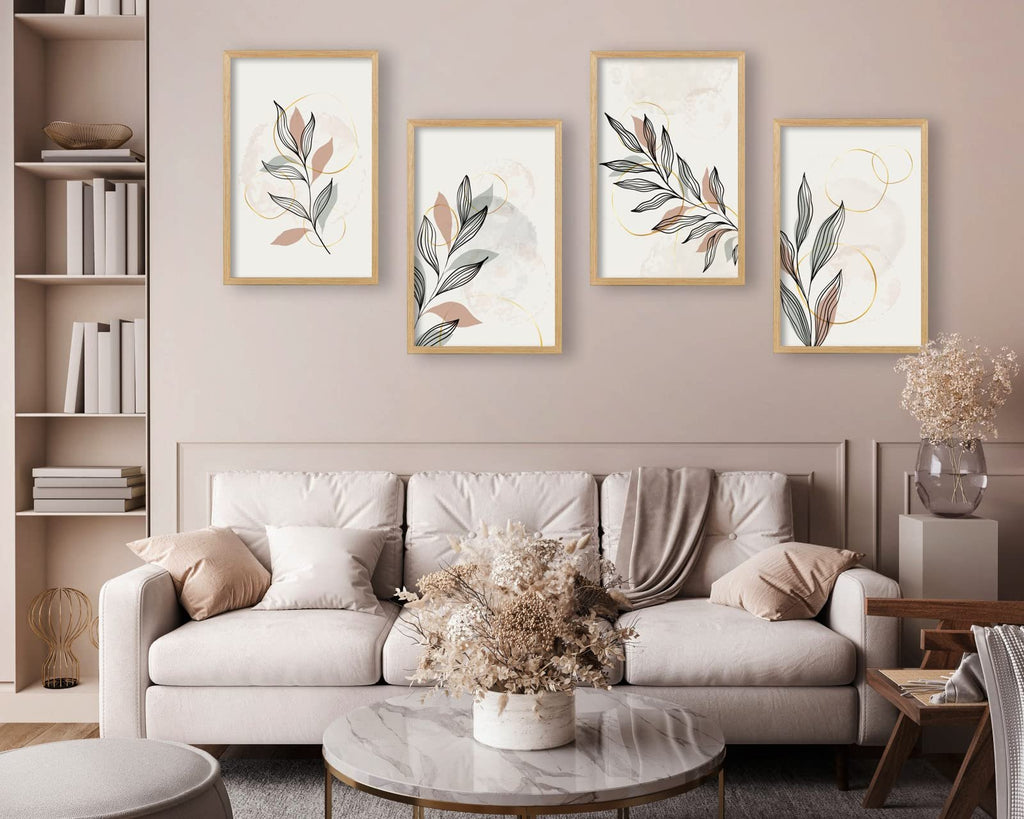 Four framed botanical prints with abstract circles displayed above a sofa in a living room setting.