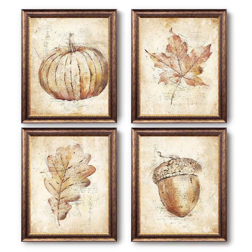 Set of 4 framed vintage fall wall art prints featuring a pumpkin, maple leaf, oak leaf, and acorn.