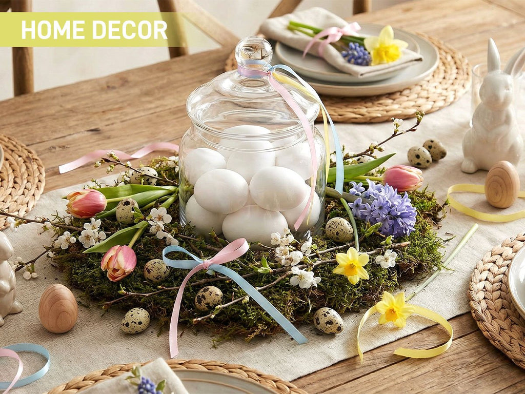 Easter table centerpiece with white wooden eggs in a glass jar, moss, tulips, daffodils, and quail eggs.