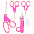 Four pairs of pink and light pink handled scissors on a white background, including fabric shears, embroidery scissors, and thread snips.