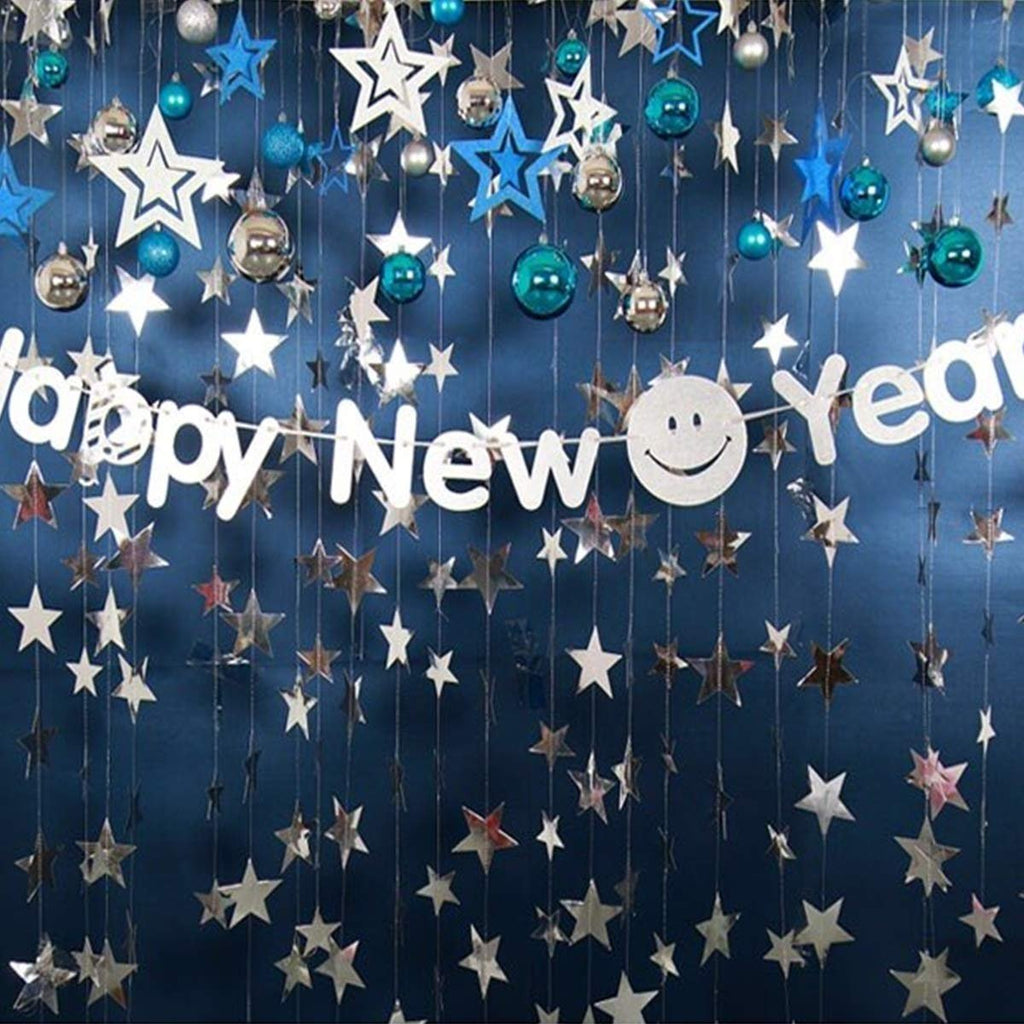 Silver and blue star garlands with a 'Happy New Year' banner and smiley face, hanging against a dark blue backdrop.