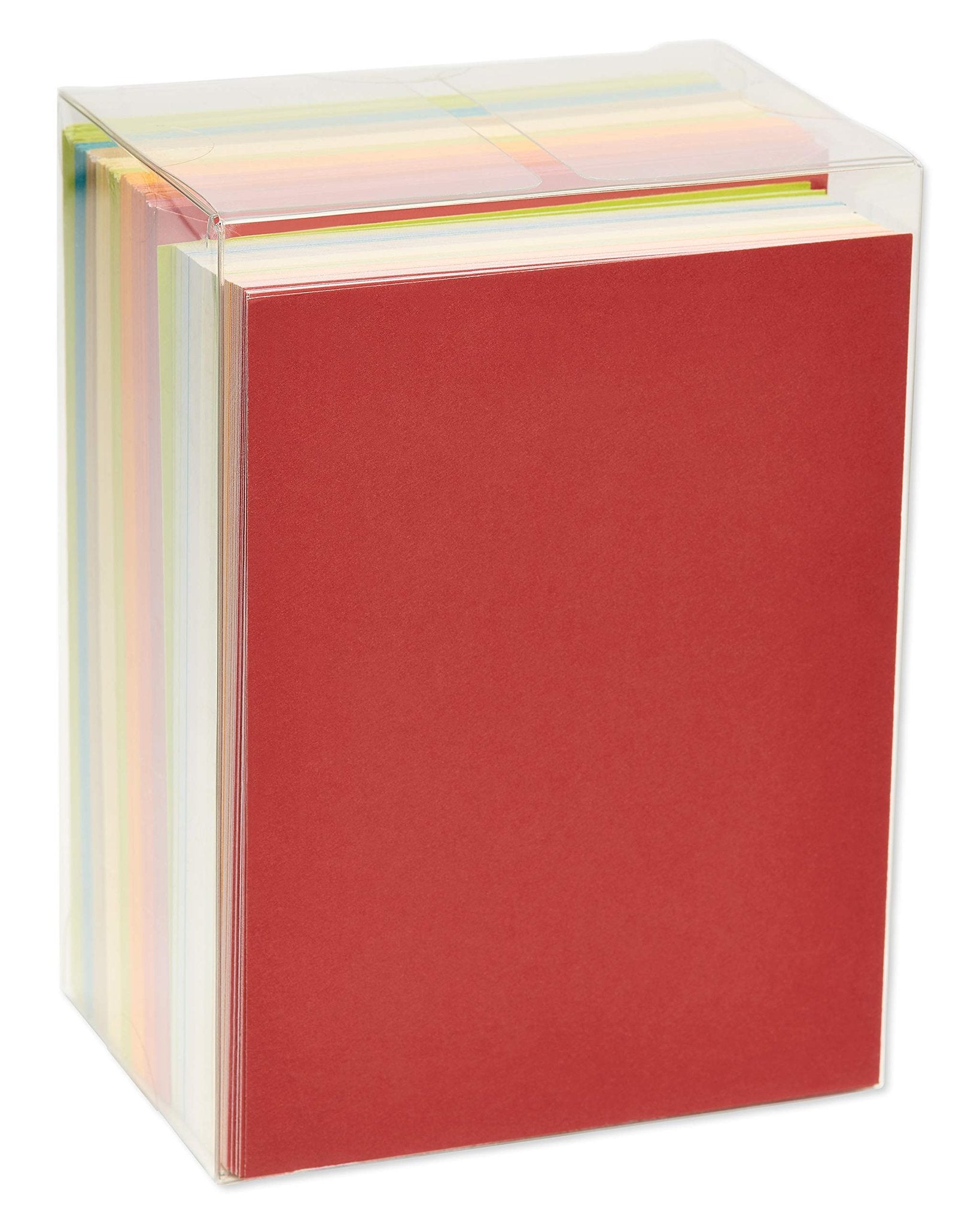 Stack of blank note cards in earthtone colors inside a clear plastic box, front view with red card prominent.