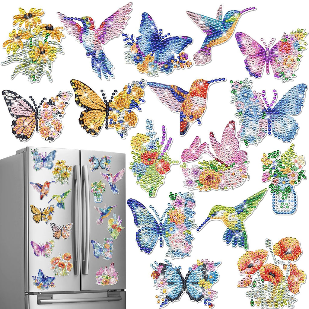 Diamond painting refrigerator magnets in various shapes including butterflies, hummingbirds, flowers, and floral arrangements, displayed on a stainless steel refrigerator.