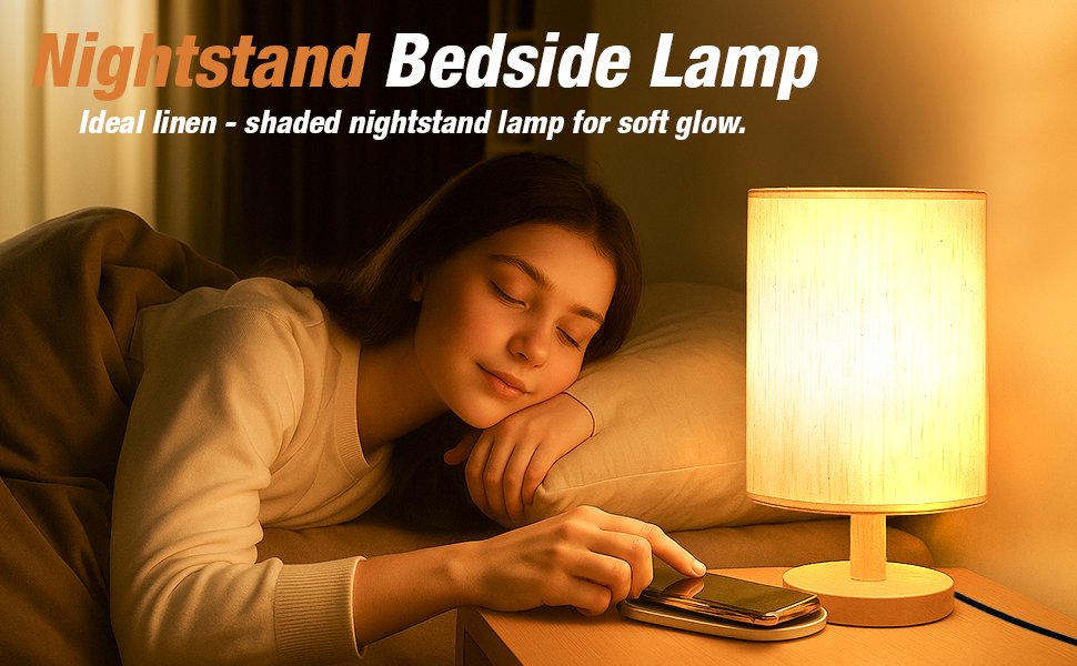 Young woman sleeping in bed next to a lit bedside lamp with a fabric shade and wood base.