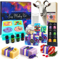 Soap making kit contents including goat milk base, essential oils, dyes, silicone mold, and finished soaps.