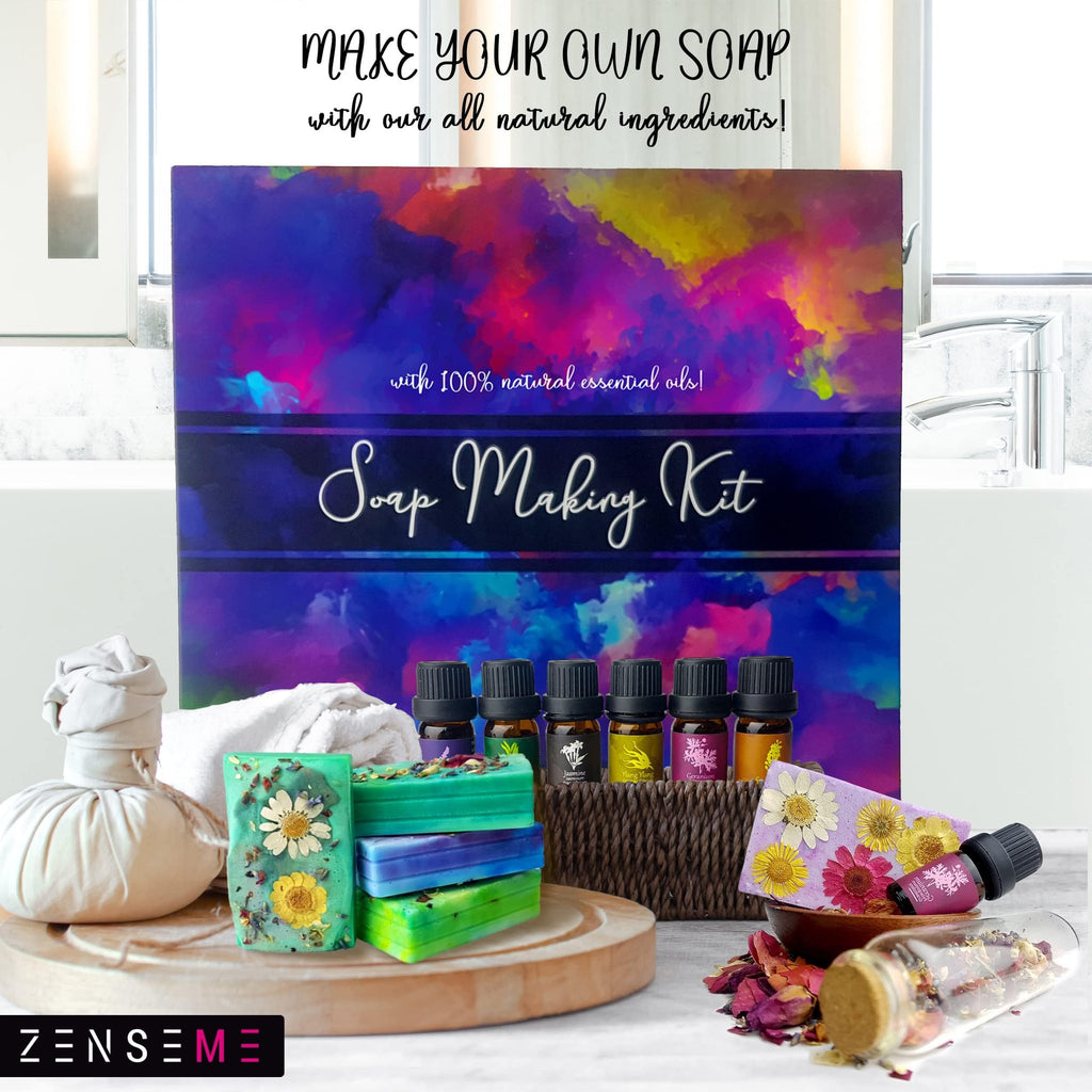 Soap making kit contents including bars of soap, essential oil bottles, dried flowers, and a wooden tray.