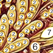 Diamond painting canvas detail showing numbered sections with yellow circles and rhinestones, featuring numbers 2, 6, and 7.