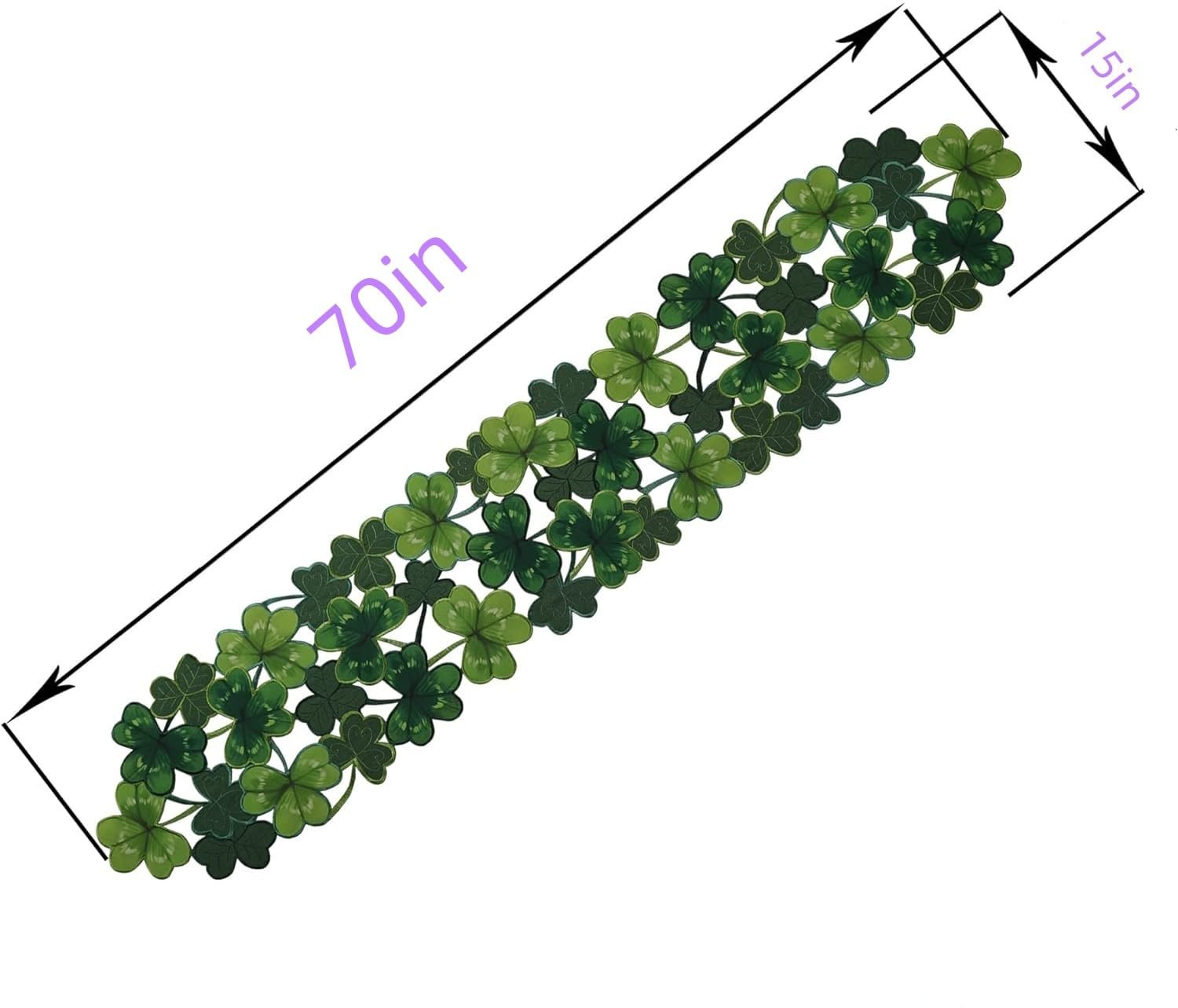 Green polyester table runner with embroidered clover cutouts, shown with dimensions 70in and 15in.