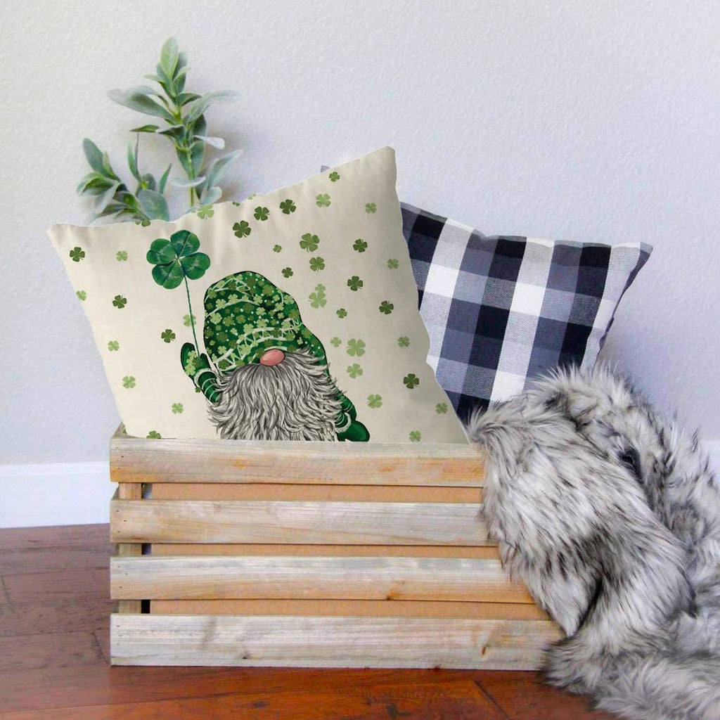 St. Patrick's Day pillow cover with a gnome holding a shamrock, surrounded by smaller shamrocks.